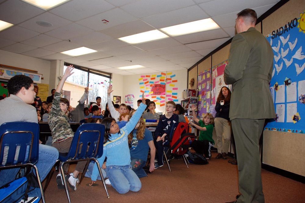 Marine Major Surprises Fifth Graders with Scrapbook Visit