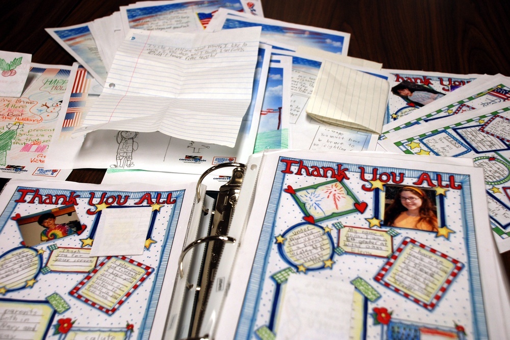 Students Create Pages for World's Largest Scrapbook for Military Families
