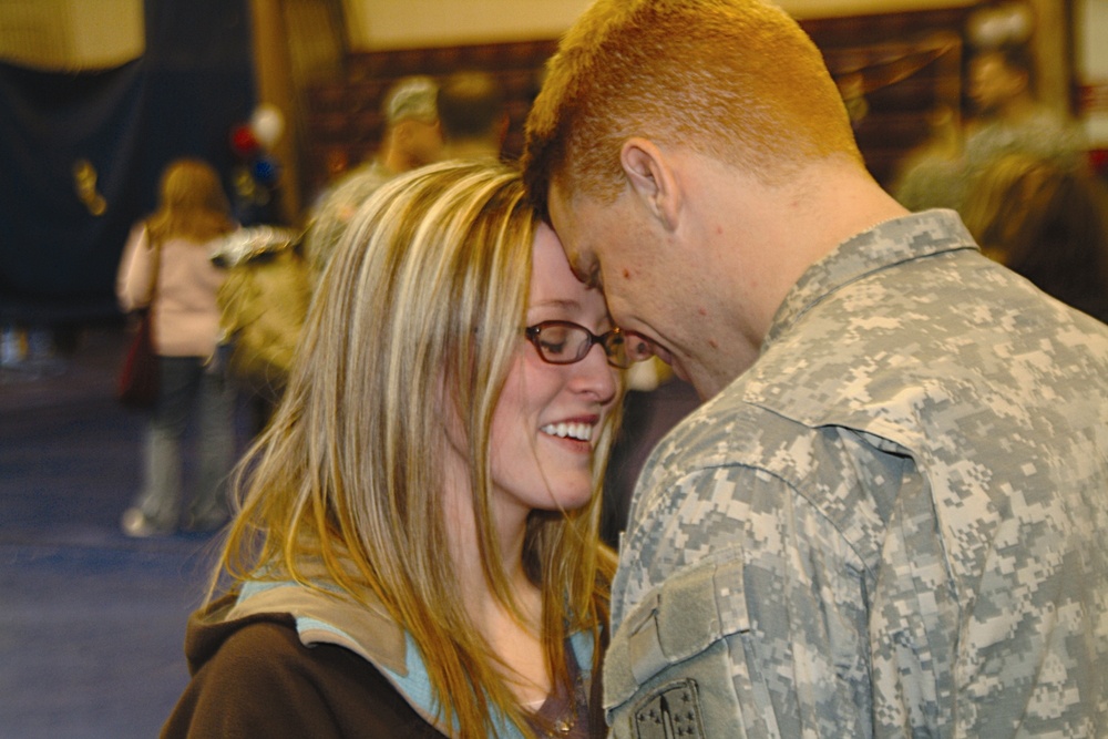 Soldier Reunited with Wife at Fort Wainwright Homecoming Ceremony