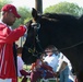 Army Sergeant Bonds with Therapy Horse at 'Horses for Heroes' Event