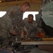 Soldiers Repair Humvee in Motor Pool