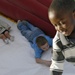 Joyful Homecoming: Children Delight at 101st Airborne Division Picnic