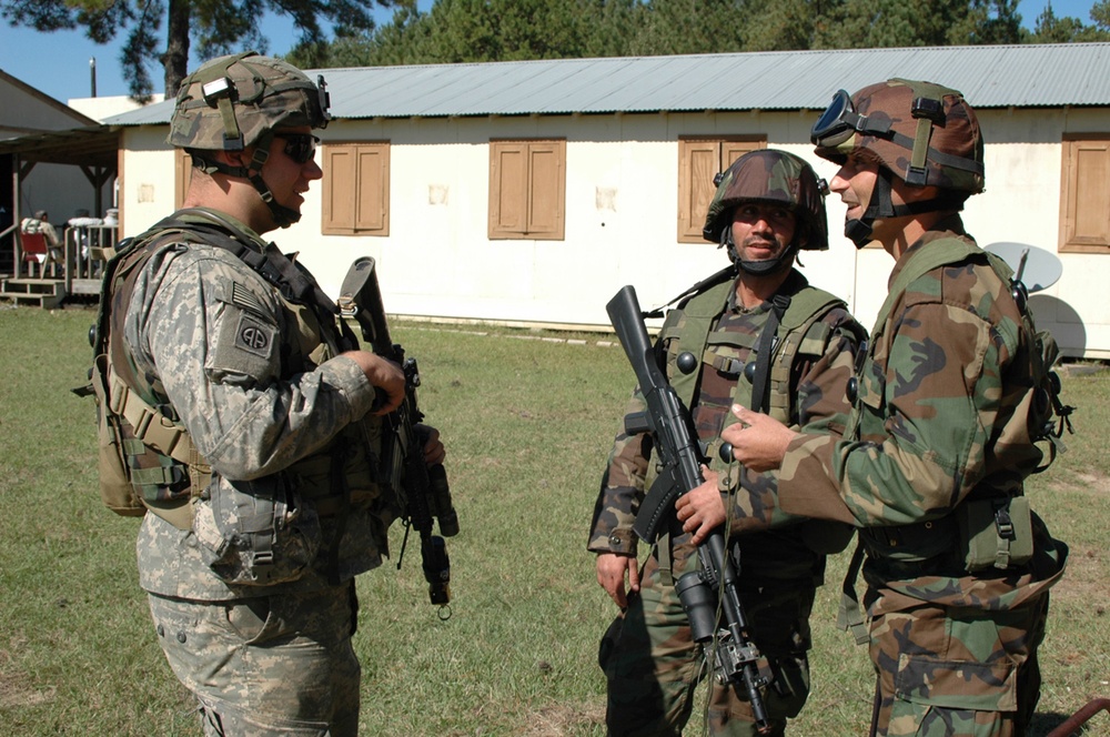 U.S. Army Soldier Engages with Afghan Counterparts During Joint Training Exercise