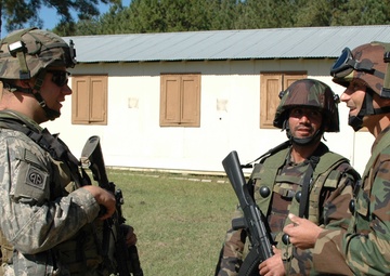 U.S. Army Soldier Engages with Afghan Counterparts During Joint Training Exercise