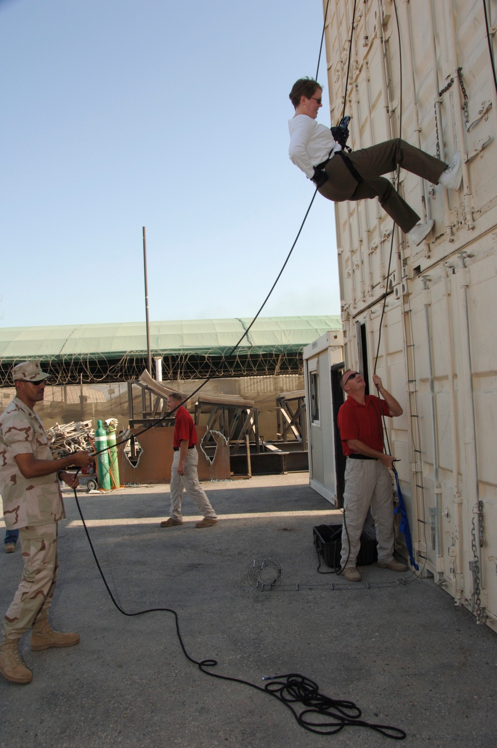 Manpower VP Rappels Down Shipping Containers in Bahrain Military Exercise