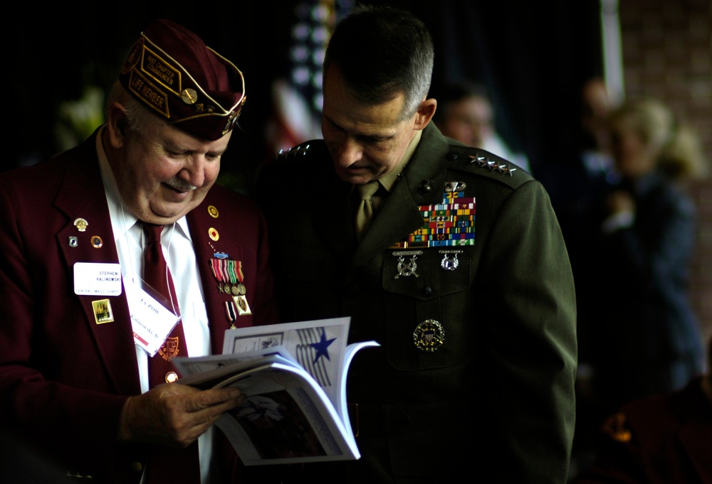 Former POW Shares Memorial Concert Program with Joint Chiefs Chairman