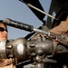 Army Cpl. Fuels Chinook Helicopter for Earthquake Relief Mission in Pakistan