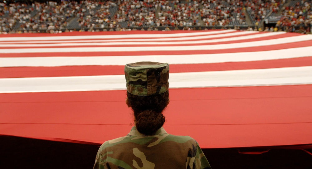 Massive Flag Unfurled at Texans-Redskins Game to Honor Military