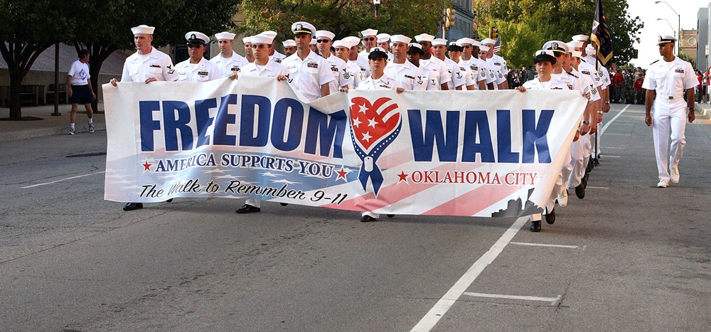 Navy Members at Tinker AFB Carry Freedom Walk Banner