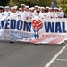 Navy Members at Tinker AFB Carry Freedom Walk Banner