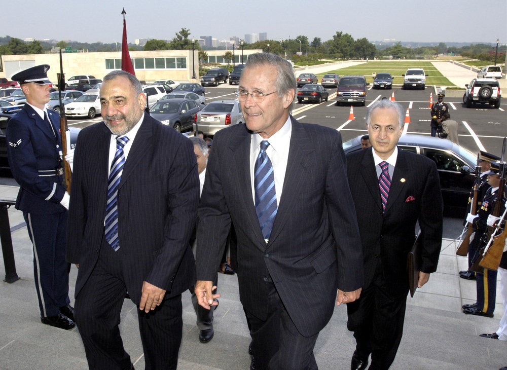 Rumsfeld Escorts Iraqi Deputy President Through Pentagon Honor Guard