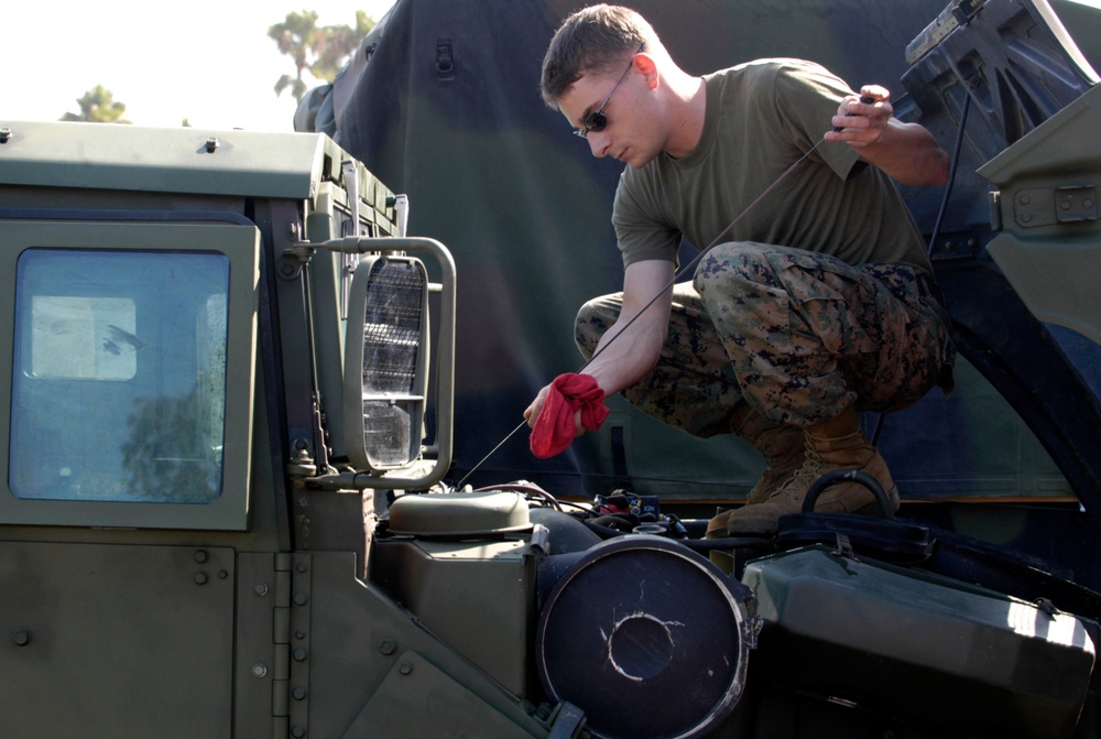 Marine Corps Mechanic Prepares Humvee for Deployment