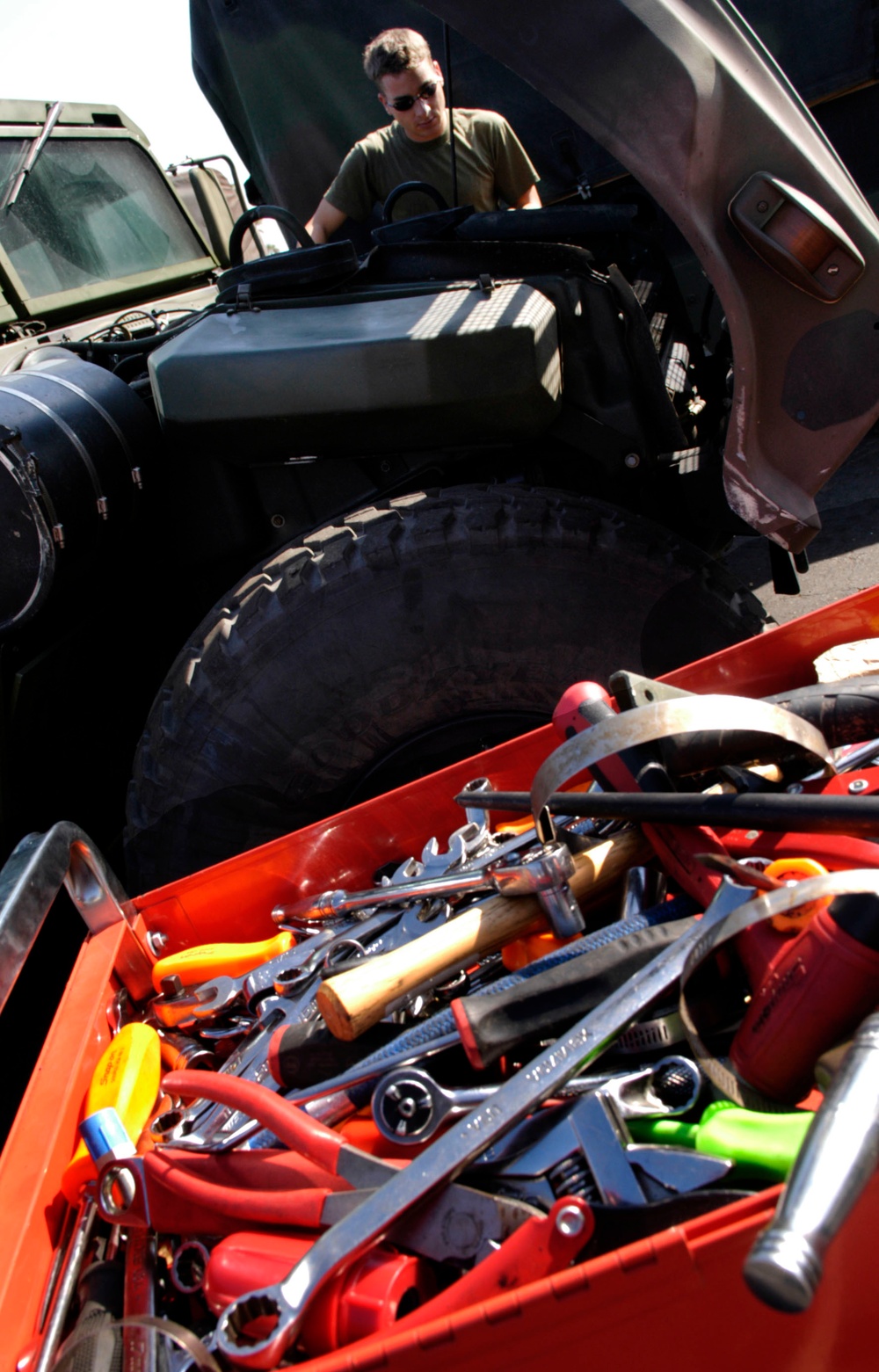 Marine Corps Mechanic Prepares Humvee for Deployment