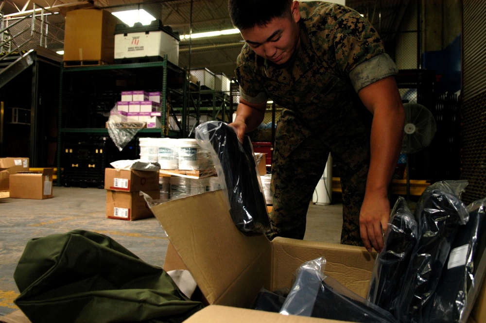 Marine Corps Cpl. Prepares Supplies for Upcoming Deployment
