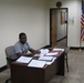 Army Recruiting Commander Poses in Hollywood Office