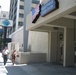 Pedestrians Pass by Armed Forces Career Center in Hollywood
