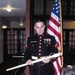 Marine Cpl. Tony Montgomery Holds Presentation Cane