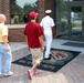 Navy Recruiter Guides Recruits into Baltimore Processing Station