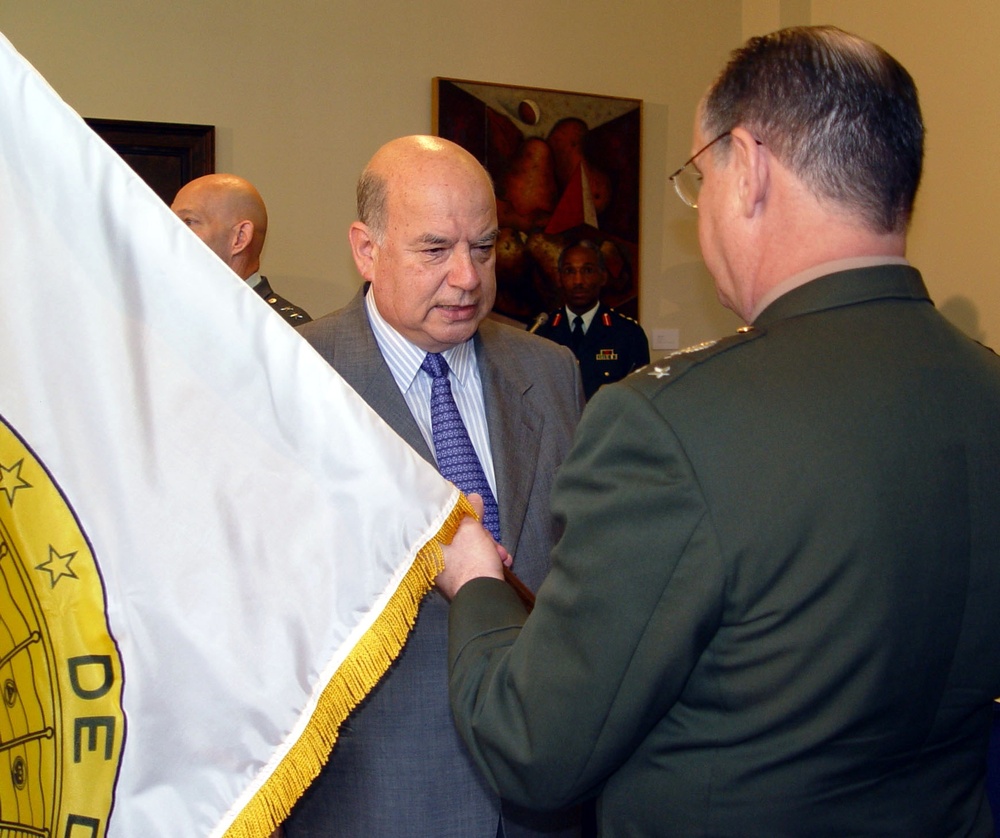 OAS Secretary-General Passes IADB Flag to Brazilian General at Transfer Ceremony