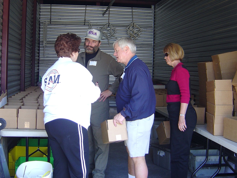 Operation: S.A.M. Volunteers Pack Boxes for Troops Worldwide