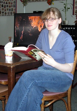 Navy Sailor Relaxes at USO Lounge Before Flight