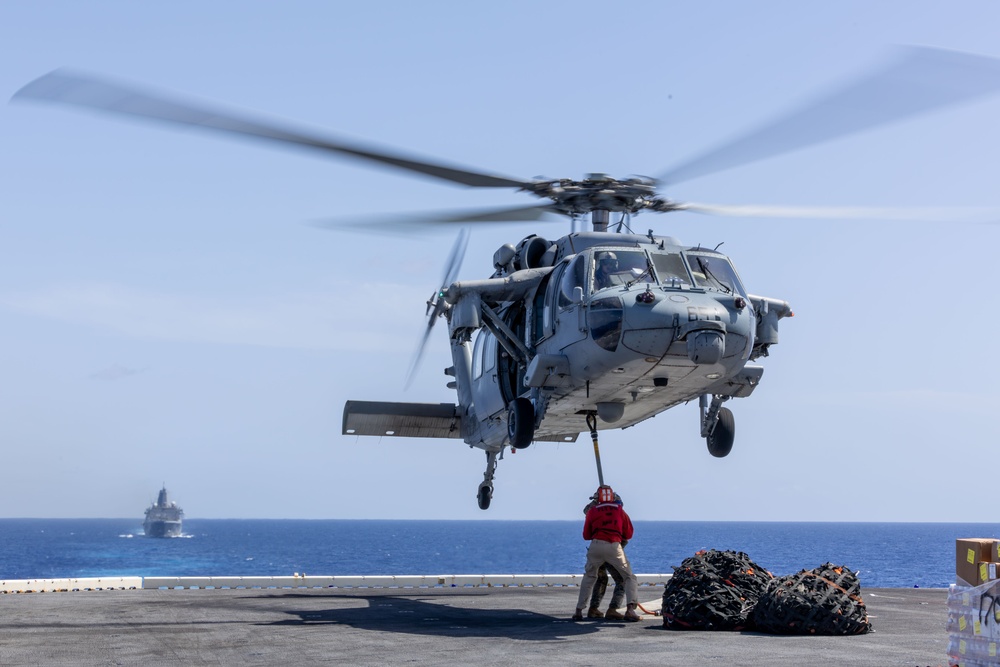 USS Iwo Jima conducts vertical replenishment at sea