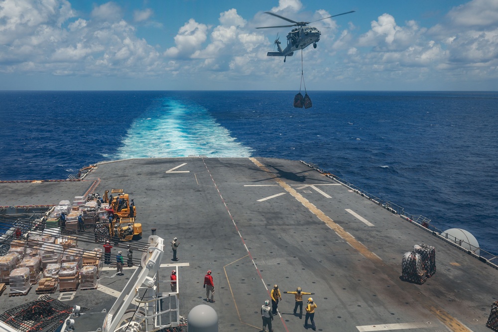 MH-60S Seahawks drop of supplies during USS Iwo Jima's RAS