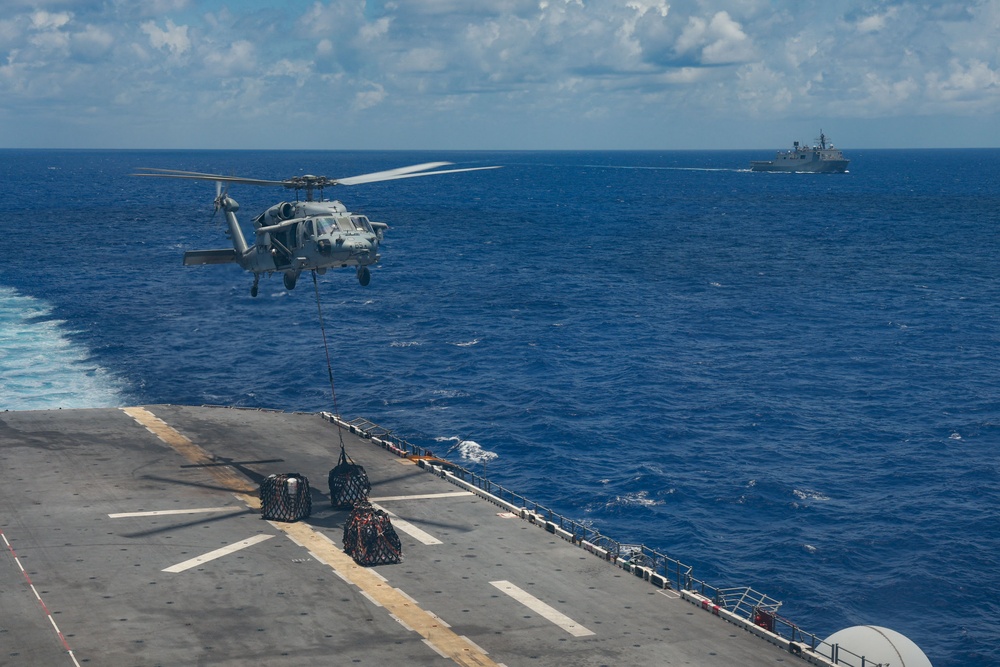MH-60S Seahawks drop of supplies during USS Iwo Jima's RAS