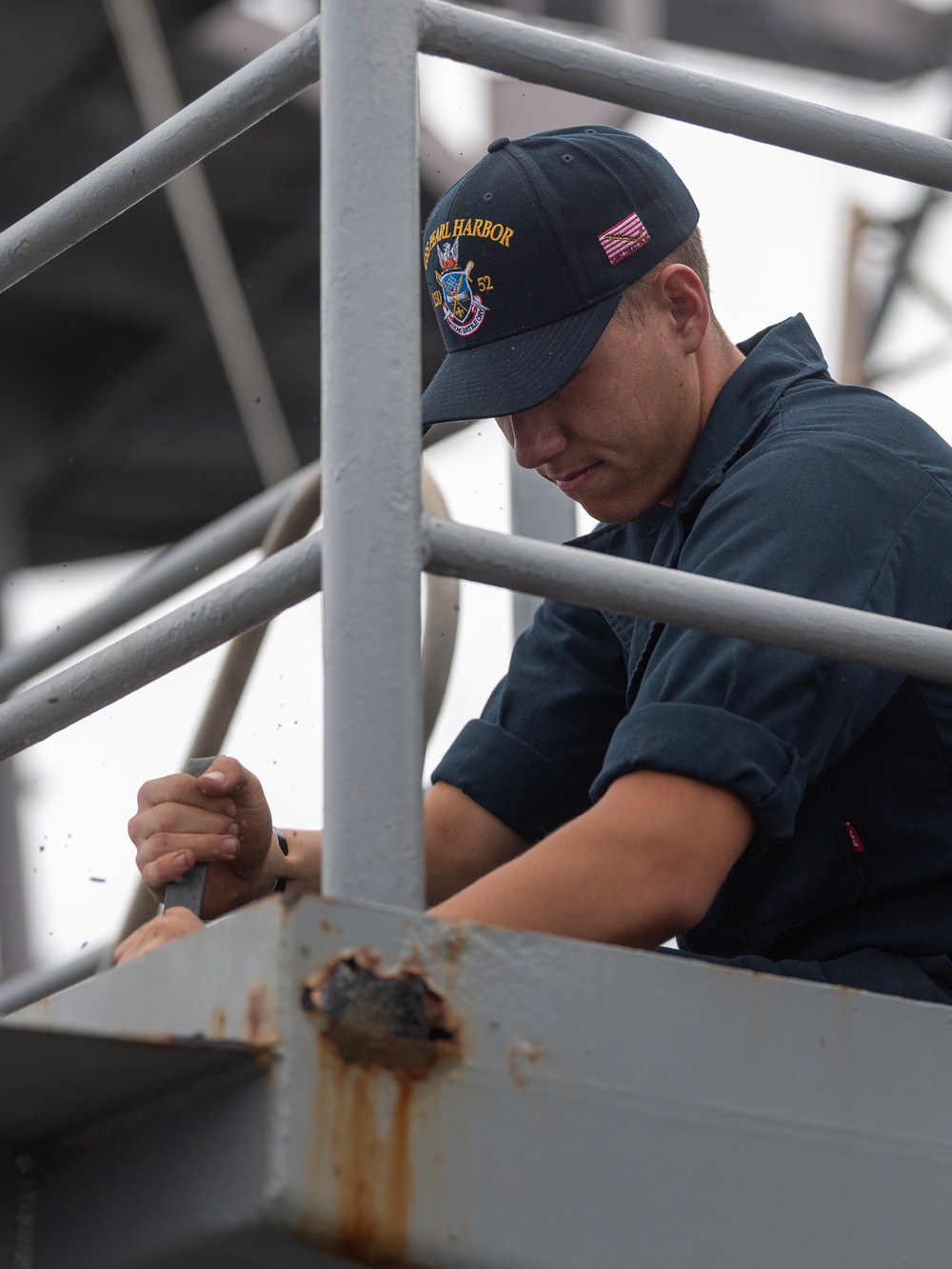 USS PEARL HARBOR (LSD 52) deck department Sailors perform corrosion control