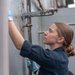 USS PEARL HARBOR (LSD 52) deck department Sailors perform corrosion control