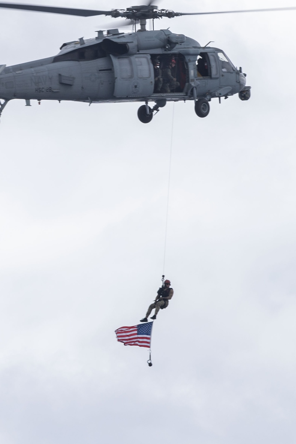 Helicopter Flies American Flag During The Fouth Of July