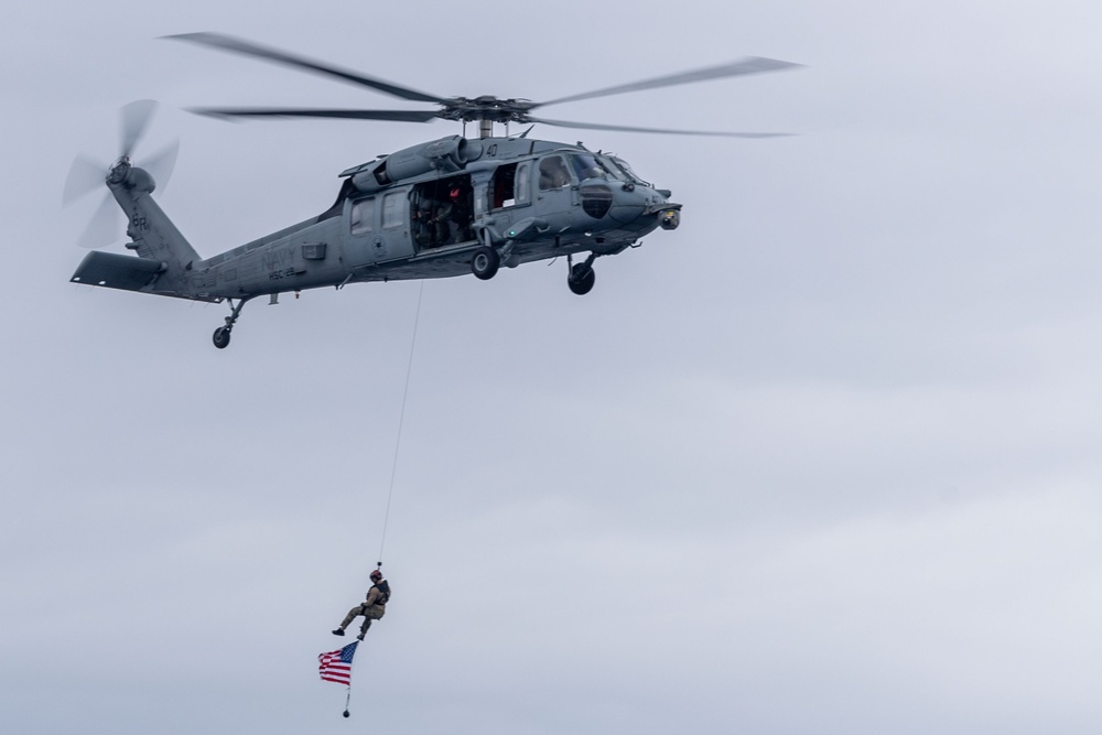 Helicopter Flies American Flag During The Fouth Of July