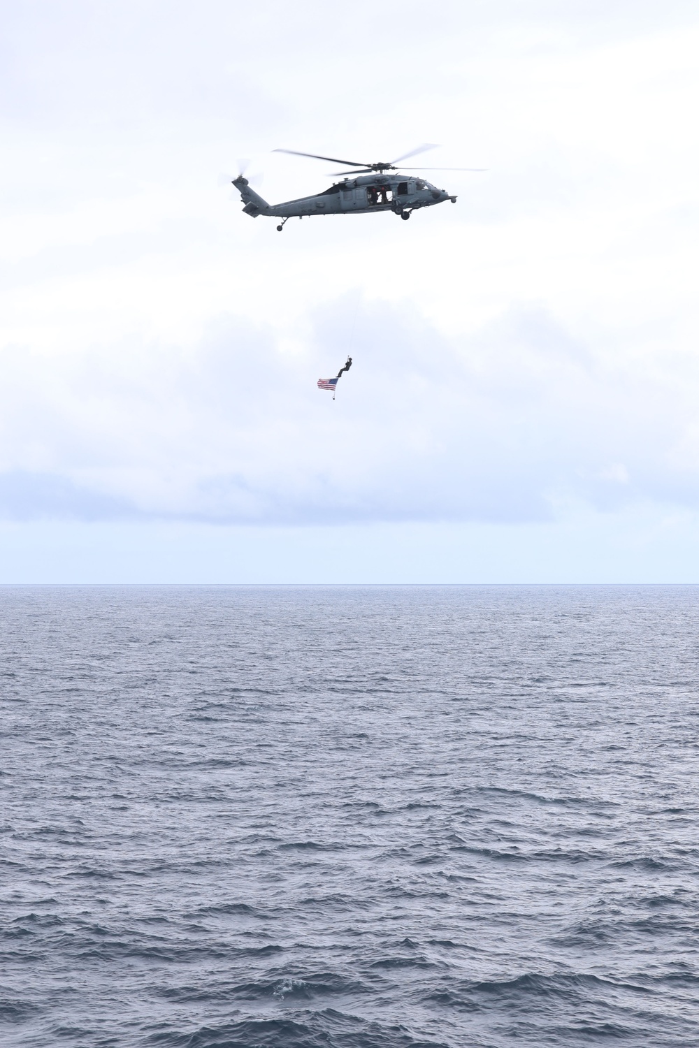 Helicopter Flies American Flag During The Fouth Of July