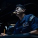 USS Mahan (DDG 72) Sailor Stands Combat Information Center Watch
