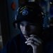 USS Mahan (DDG 72) Sailor Stands Combat Information Center Watch