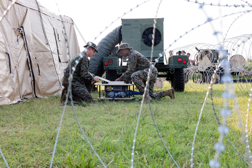 U.S. Marines with MWSS-273 set up expeditionary air conditioning during Atlantic Alliance 2025