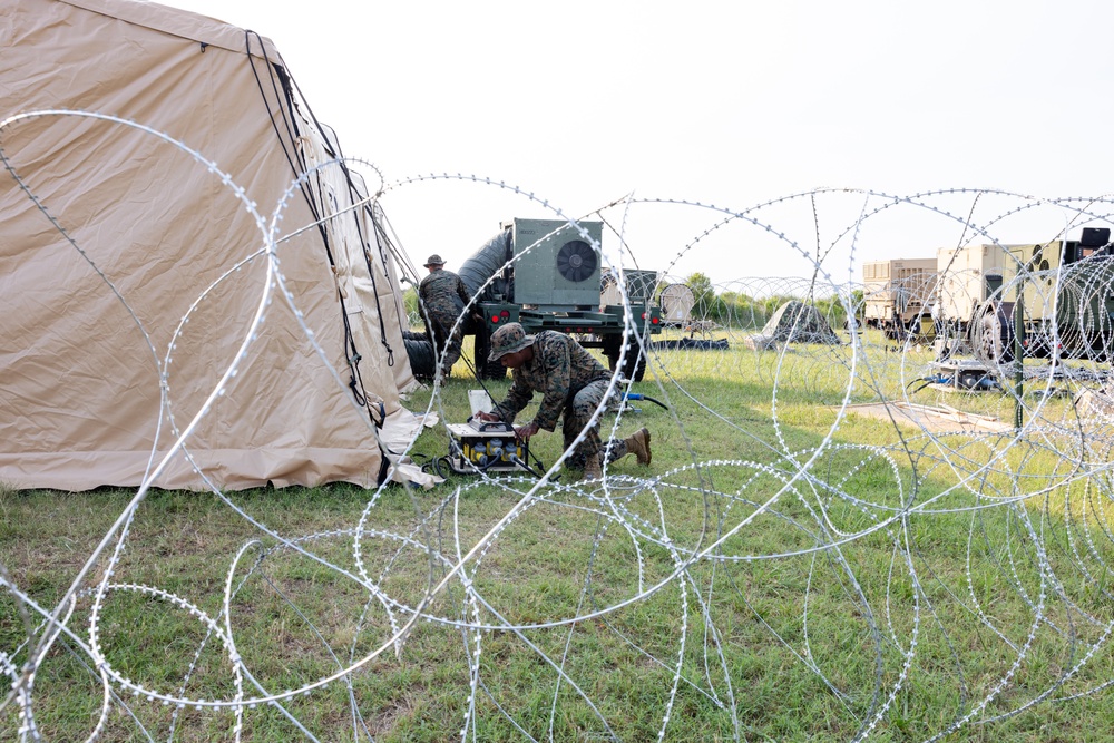 U.S. Marines with MWSS-273 set up expeditionary air conditioning during Atlantic Alliance 2025