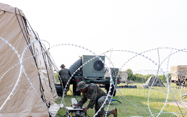 U.S. Marines with MWSS-273 set up expeditionary air conditioning during Atlantic Alliance 2025