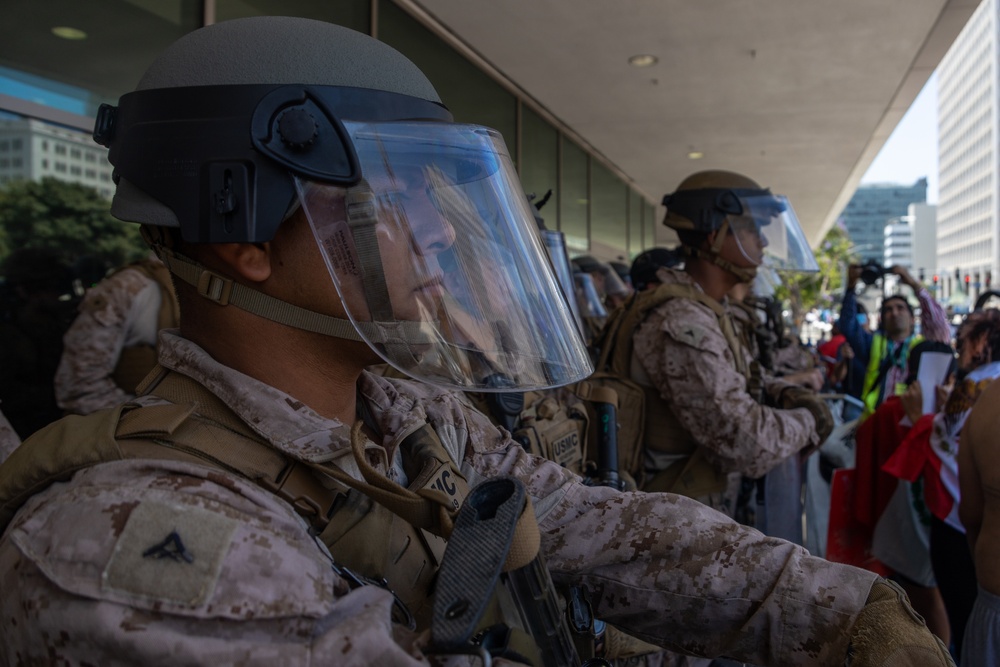U.S. Marines guard federal building to assist California Army National Guard