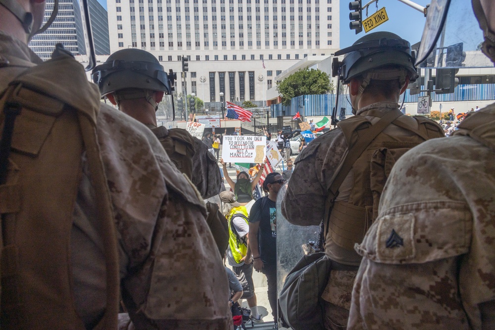 U.S. Marines guard federal building to assist California Army National Guard