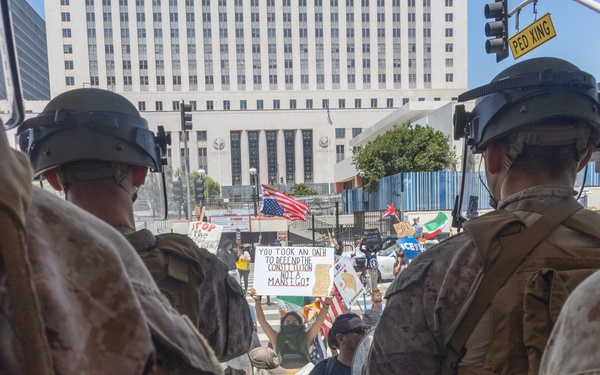 U.S. Marines guard federal building to assist California Army National Guard