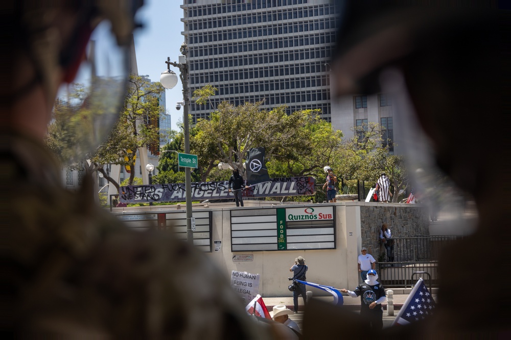 U.S. Marines guard federal building to assist California Army National Guard