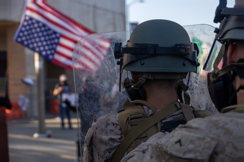 U.S. Marines guard federal building to assist California Army National Guard