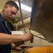USS Gerald R. Ford (CVN 78) Sailors Work in Ship's Laundry