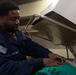 USS Gerald R. Ford (CVN 78) Sailors Work in Ship's Laundry