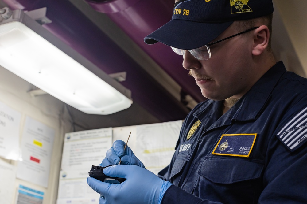USS Gerald R. Ford (CVN 78) Sailor Performs Armory Maintenance