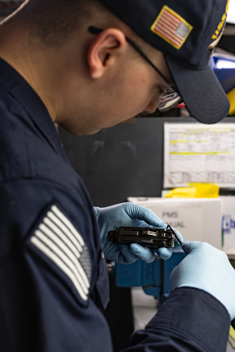 USS Gerald R. Ford (CVN 78) Sailor Performs Armory Maintenance