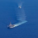 USS Iwo Jima and the USS Fort Lauderdale conduct underway operations