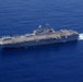 USS Iwo Jima and the USS Fort Lauderdale conduct underway operations
