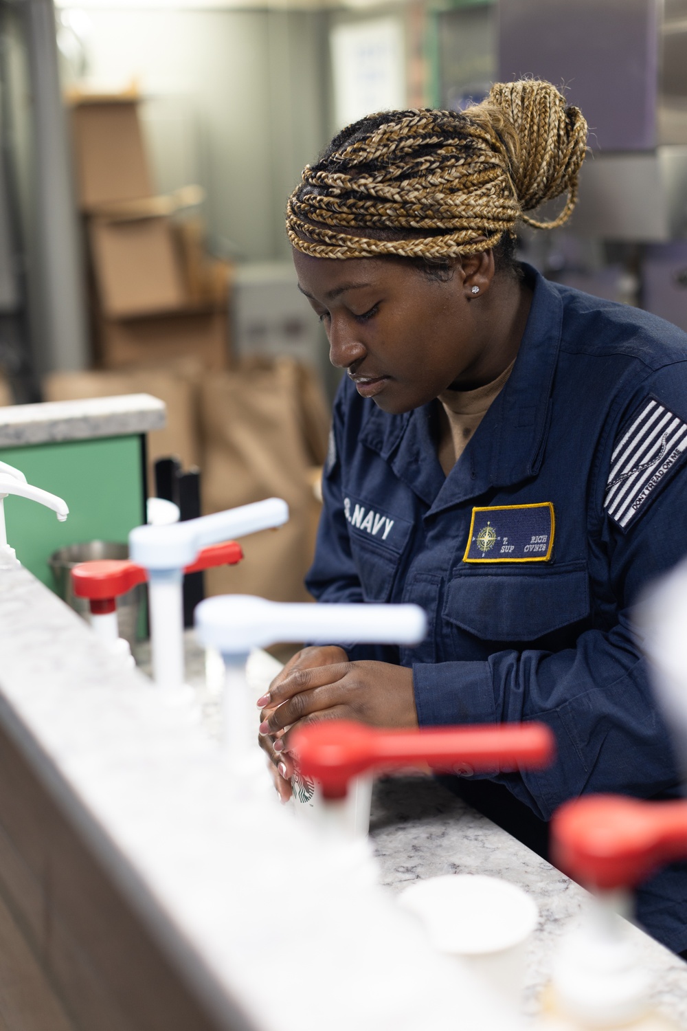 USS Gerald R. Ford (CVN 78) Retail Services Specialist Makes Beverages